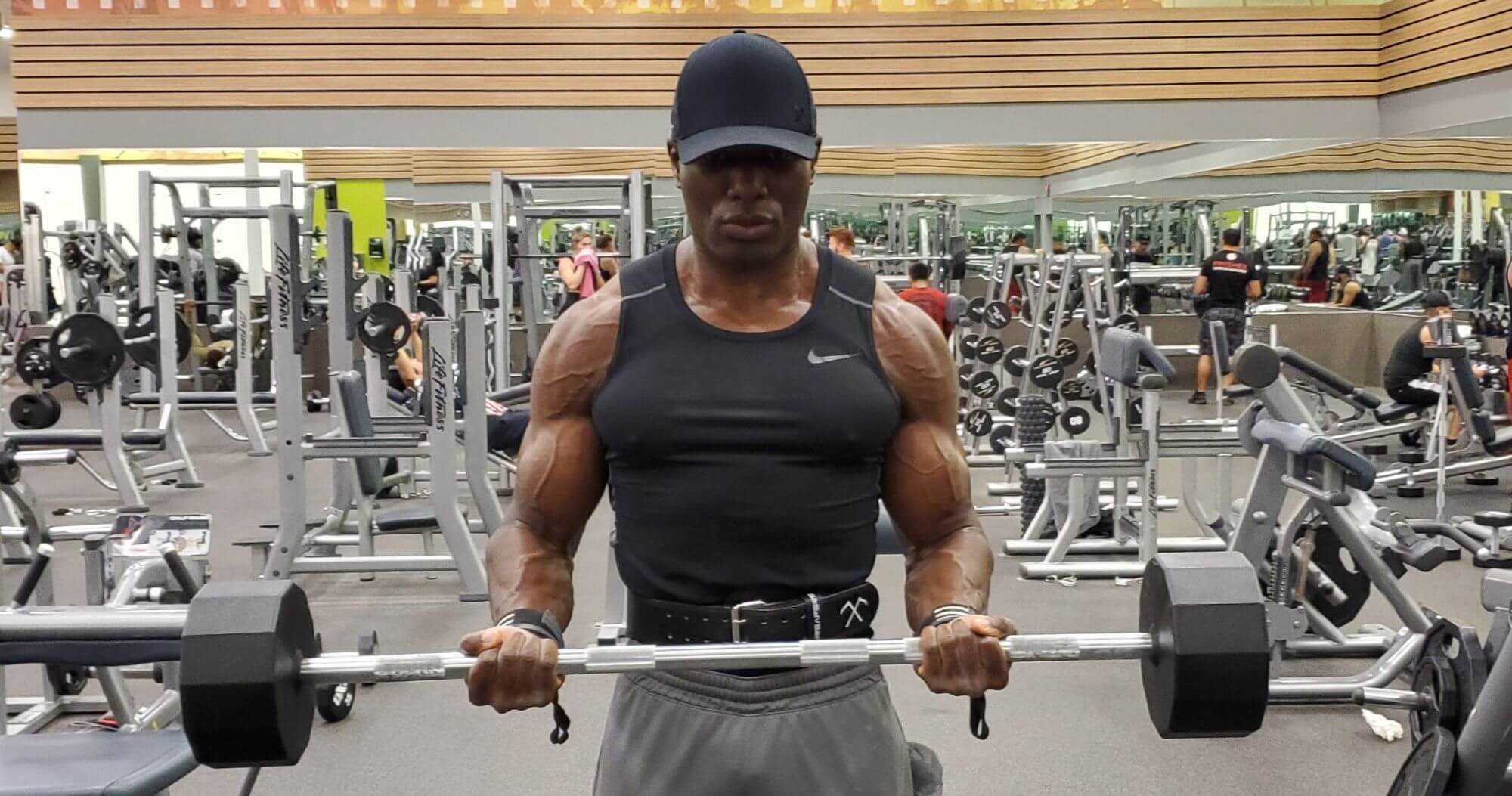 Nurudeen perform one of his favorite biceps exercises: barbell biceps curl