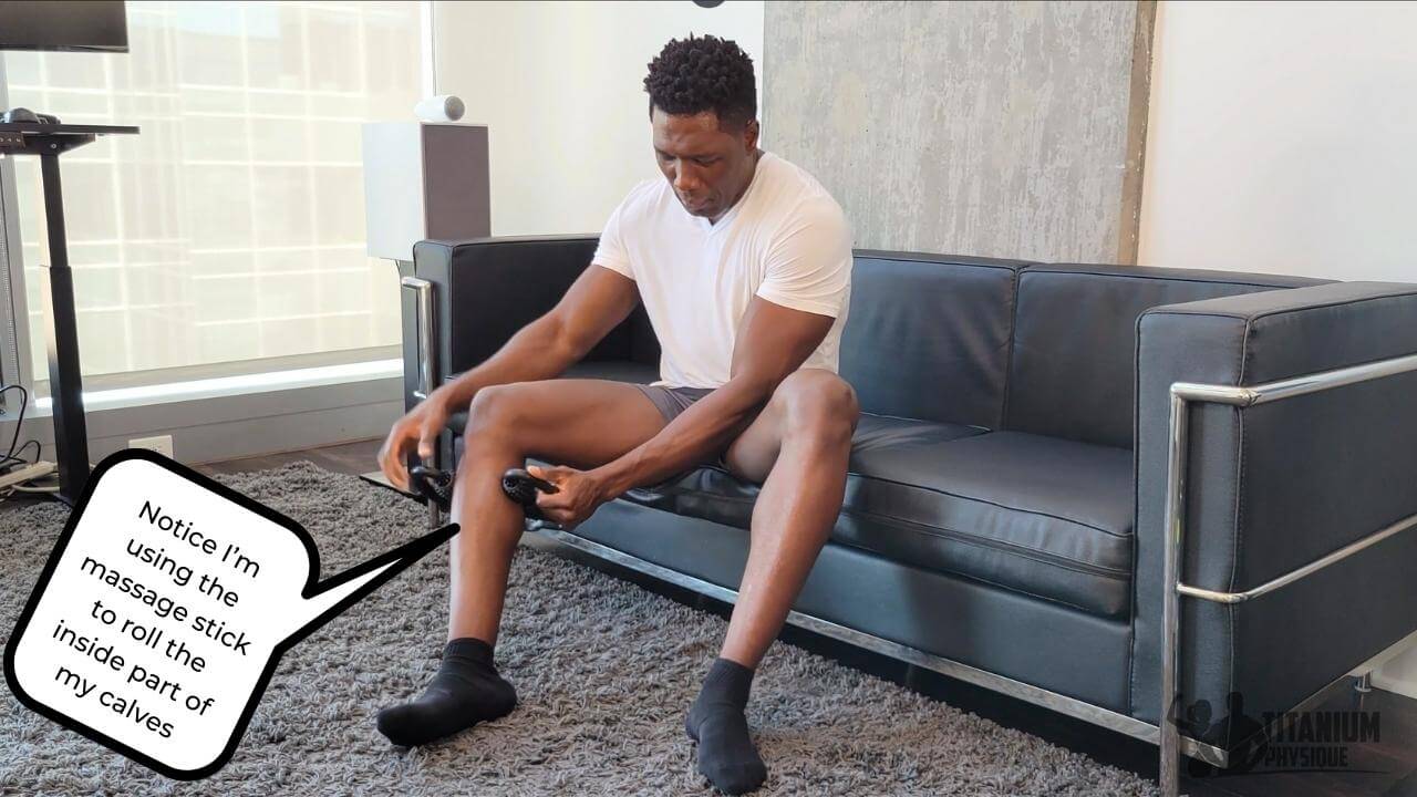 Nurudeen performs a gastrocnemius self-massage exercise for achilles tendonitis